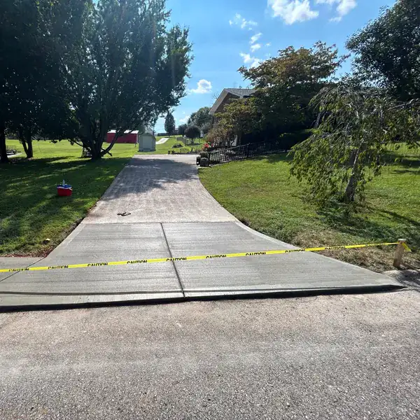 New concrete drive tied into the existing street edge