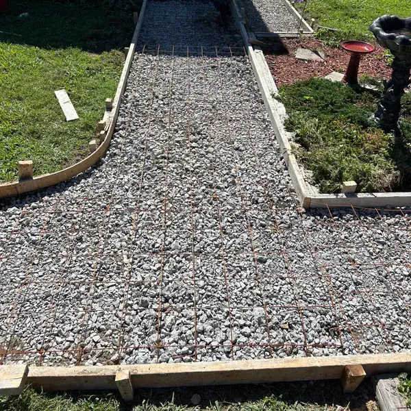 Formed and gravel-based walkway ready for concrete